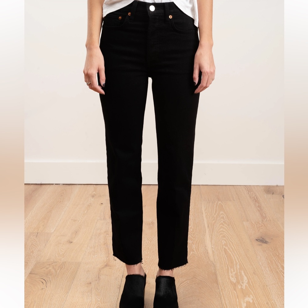 Re/Done high rise stovepipe raw hem jeans in jet black Size 28